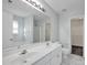 Bathroom boasts double sinks, a tub, and a walk-in closet at 9150 Austin Ridge Ln, Charlotte, NC 28214