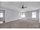 Spacious bedroom with carpet flooring and ceiling fan at 9150 Austin Ridge Ln, Charlotte, NC 28214