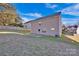 Rear view of house showing patio and yard at 9150 Austin Ridge Ln, Charlotte, NC 28214