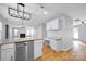 Modern kitchen with granite countertops and white cabinets at 9150 Austin Ridge Ln, Charlotte, NC 28214