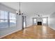 Bright living room with fireplace and laminate flooring at 9150 Austin Ridge Ln, Charlotte, NC 28214