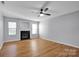 Spacious living room with fireplace and hardwood floors at 9150 Austin Ridge Ln, Charlotte, NC 28214