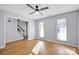 Hardwood floors, gray walls, and a view of the staircase at 9150 Austin Ridge Ln, Charlotte, NC 28214