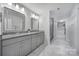 Modern bathroom with double vanity, granite countertop and walk-in shower at 925 Gray Hook Dr, Fort Mill, SC 29708