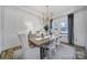 Elegant dining room featuring a chandelier and hardwood floors at 925 Gray Hook Dr, Fort Mill, SC 29708