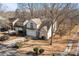 Aerial view of two story house and neighborhood at 9600 Kayce Ln, Charlotte, NC 28213