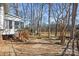 Spacious backyard with wooden fence and mature trees at 9600 Kayce Ln, Charlotte, NC 28213