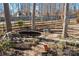 Landscaped backyard with pond feature at 9600 Kayce Ln, Charlotte, NC 28213