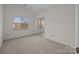 Bedroom with mirrored closet doors and window at 9600 Kayce Ln, Charlotte, NC 28213