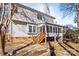 House exterior showcasing sunroom and patio at 9600 Kayce Ln, Charlotte, NC 28213