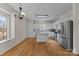 Modern kitchen with stainless steel appliances and white cabinets at 9600 Kayce Ln, Charlotte, NC 28213