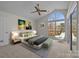 Main bedroom with vaulted ceiling and access to balcony at 9600 Kayce Ln, Charlotte, NC 28213