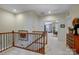 Upper hallway with neutral decor and access to bedrooms at 10715 Campbell Commons Way, Charlotte, NC 28277