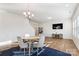 Bright dining area adjacent to the kitchen and living room at 128 Mooring Dr, Statesville, NC 28677