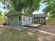 Spacious backyard with a large deck and storage shed at 1317 Downs Ave, Charlotte, NC 28205