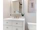 Bathroom boasts a white vanity, quartz countertop and a shower at 1317 Downs Ave, Charlotte, NC 28205
