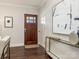 Bright entryway with hardwood floors and elegant wall art at 1317 Downs Ave, Charlotte, NC 28205