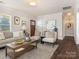 Spacious living room featuring hardwood floors and stylish furniture at 1317 Downs Ave, Charlotte, NC 28205