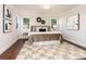 Spacious main bedroom with hardwood floors and large windows at 1317 Downs Ave, Charlotte, NC 28205