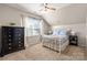 Charming bedroom with a metal bed frame and window seating at 1365 Kings Bottom Dr, Fort Mill, SC 29715