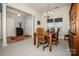 Spacious dining room with hardwood floors and views of both entry and living room at 137 Montrose Dr, Mooresville, NC 28115