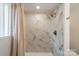 Stunning bathroom featuring marble tile, modern fixtures and a glass-enclosed shower at 1410 Mays Chapel Church Rd, Newton, NC 28658