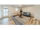 Inviting living room with comfortable seating, stylish rug, and ample natural light at 1410 Mays Chapel Church Rd, Newton, NC 28658