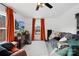 Living room with orange curtains, a large TV, and comfortable seating at 1449 Cherryville Rd, Shelby, NC 28150
