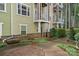 Exterior of charming townhome with walkway and landscaping at 1733-C Matheson Ave, Charlotte, NC 28205