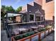 Modern restaurant with an outdoor patio, showcasing sleek design and inviting ambiance at 1733-C Matheson Ave, Charlotte, NC 28205