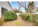 Landscaped backyard with a pathway and privacy fence at 1749 Ridgefield Ct, Rock Hill, SC 29732