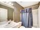 Small bathroom with shower/tub and striped wallpaper at 1749 Ridgefield Ct, Rock Hill, SC 29732