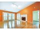 Living room with hardwood floors, fireplace and access to backyard at 1749 Ridgefield Ct, Rock Hill, SC 29732