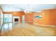Living room with hardwood floors, fireplace and chandelier at 1749 Ridgefield Ct, Rock Hill, SC 29732
