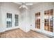 Sunroom with French doors and laminate flooring at 1749 Ridgefield Ct, Rock Hill, SC 29732