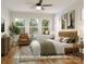 Inviting main bedroom with a tufted headboard, natural light, and cozy decor at 1913 Toddville Rd, Charlotte, NC 28214