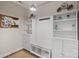 Convenient laundry room with built-in shelving and bench at 2158 Lometa Rd, York, SC 29745