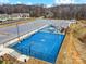 Aerial image of a community recreation area with a basketball court, playground, picnic area, and parking lot at 2214 Brandybuck Ct, Fort Mill, SC 29715