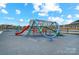 Community playground with a climbing structure and slide, great for Gathering fun and outdoor activities at 2214 Brandybuck Ct, Fort Mill, SC 29715