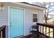Deck with teal door and black metal chair at 298 Misenheimer Nw Dr, Concord, NC 28025