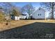 Backyard with shed and neighboring houses visible at 298 Misenheimer Nw Dr, Concord, NC 28025