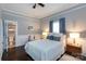 Bright bedroom with ensuite bathroom and dark hardwood floors at 298 Misenheimer Nw Dr, Concord, NC 28025
