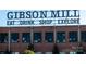 Brick building with signage indicating commercial spaces for sale at 298 Misenheimer Nw Dr, Concord, NC 28025