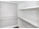Large closet with wire shelving and wooden shelves at 298 Misenheimer Nw Dr, Concord, NC 28025