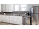 Kitchen with granite countertops and stainless steel dishwasher at 298 Misenheimer Nw Dr, Concord, NC 28025