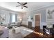 Spacious living room with hardwood floors, fireplace, and neutral decor at 298 Misenheimer Nw Dr, Concord, NC 28025