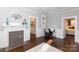 Living room with fireplace, hardwood floors and access to bedroom at 298 Misenheimer Nw Dr, Concord, NC 28025