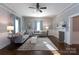 Bright and airy living room with hardwood floors and neutral decor at 298 Misenheimer Nw Dr, Concord, NC 28025