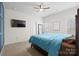 Main bedroom with a large bed and a ceiling fan at 3229 Creek Bend Ct, Sherrills Ford, NC 28673