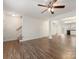 Open living space with hardwood floors and views into kitchen and dining areas at 362 Hillandale Ne St, Concord, NC 28025